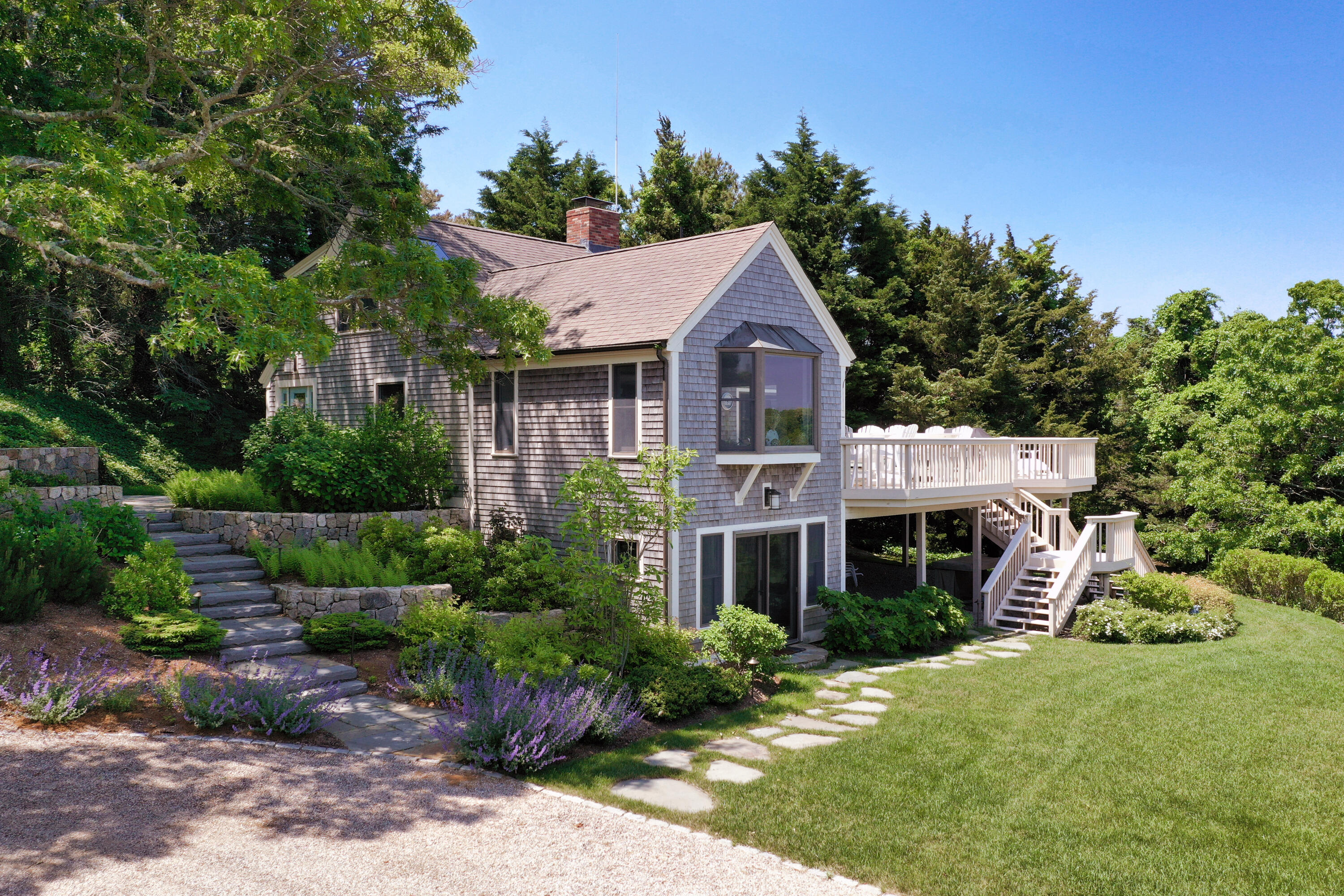 33 Ruggles Road Orleans, MA 02653 - Photo 64 of 80 a front view of a house with a yard