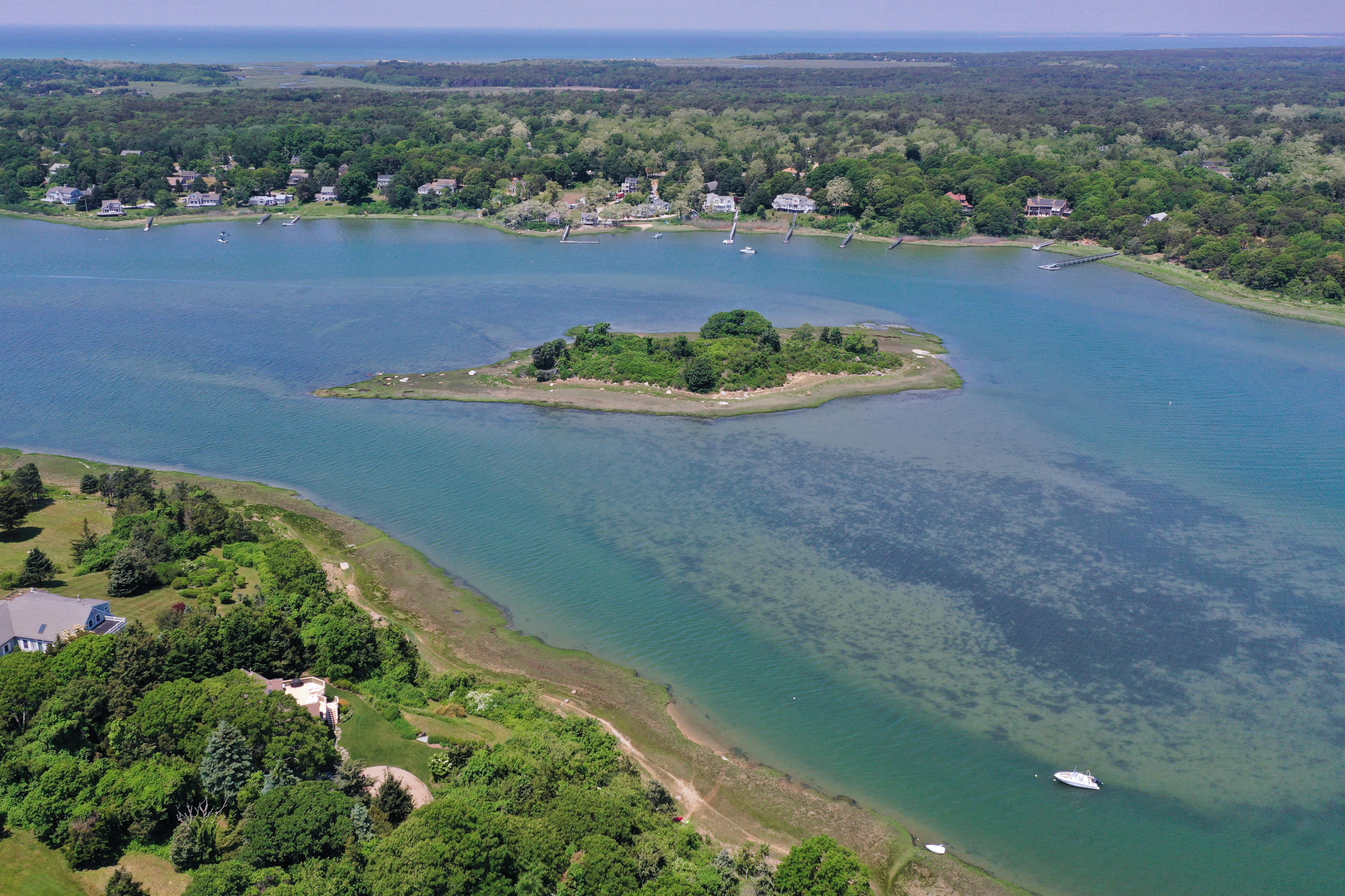 33 Ruggles Road Orleans, MA 02653 - Photo 66 of 80 an aerial view of a house with a yard