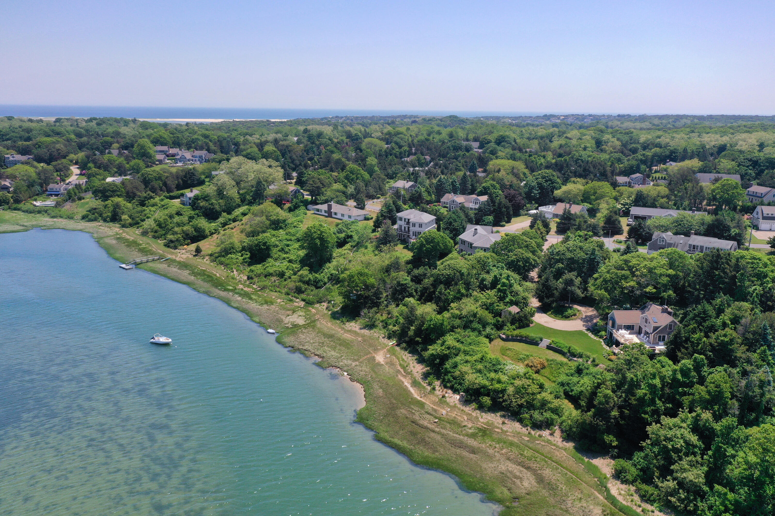 33 Ruggles Road Orleans, MA 02653 - Photo 75 of 80 an aerial view of a city with lots of residential buildings