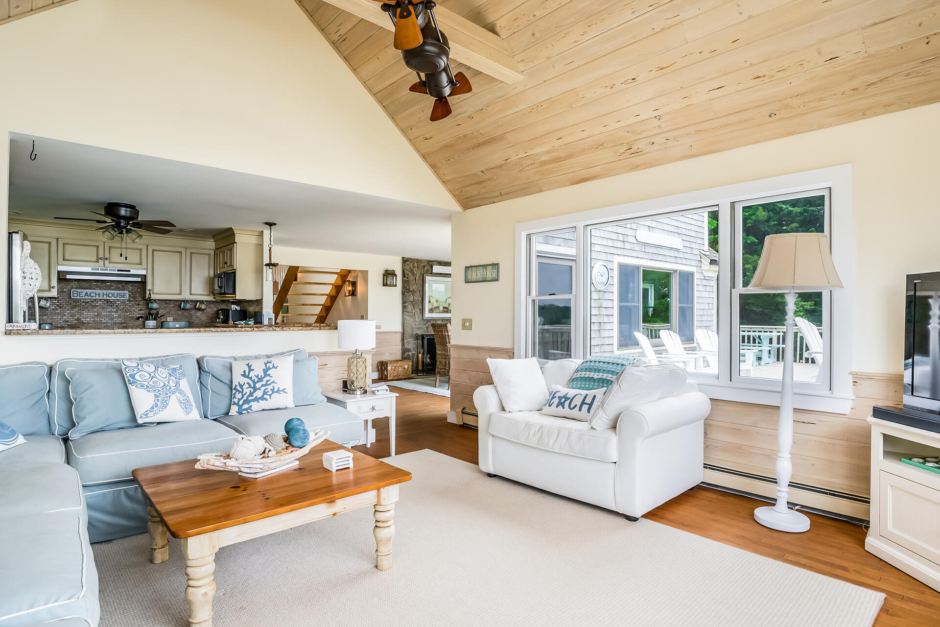 33 Ruggles Road Orleans, MA 02653 - Photo 10 of 80 a living room with furniture and a large window