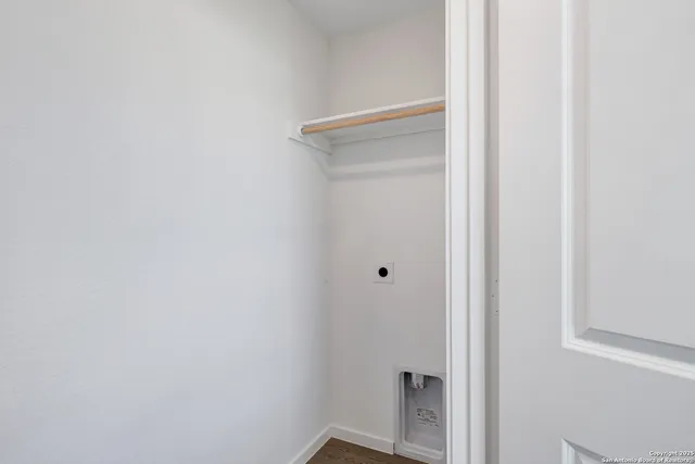 a view of a backyard with sitting area