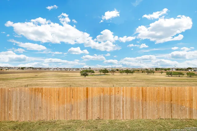 a view of a balcony with ocean view