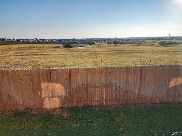 a view of an ocean from a yard