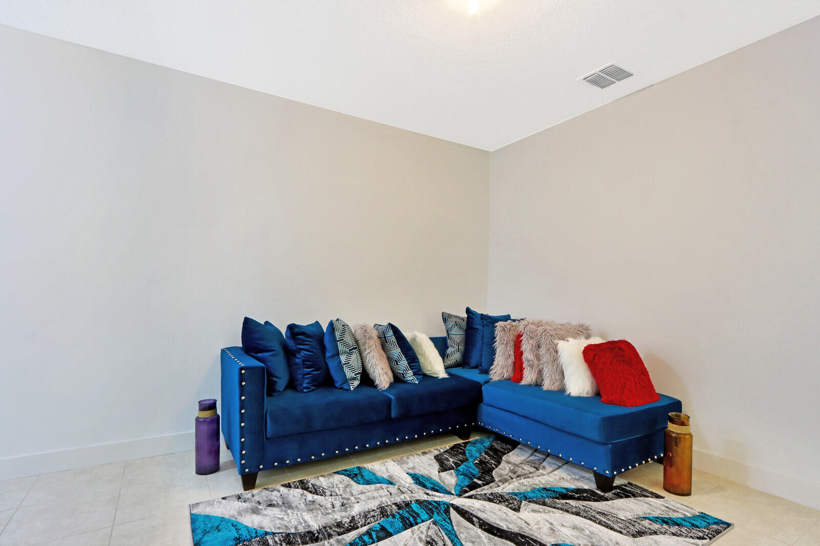 6024 Pine Tree Way Riviera Beach, FL 33410 - Photo 12 of 26 a living room with furniture and a couch