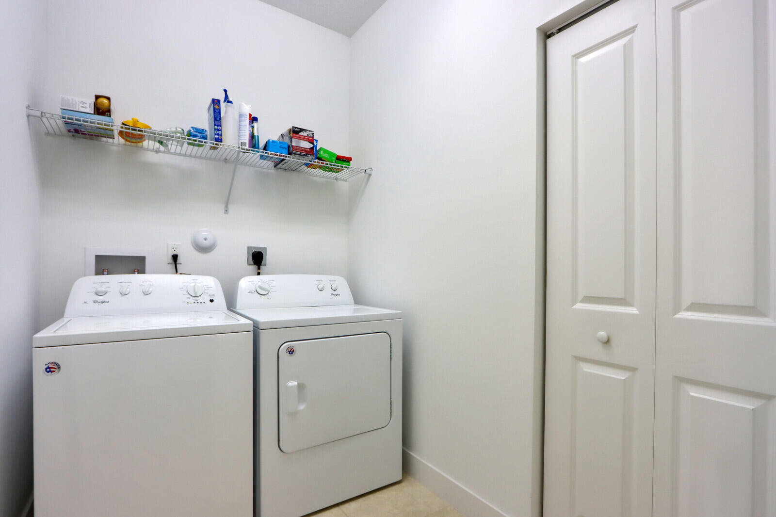 6024 Pine Tree Way Riviera Beach, FL 33410 - Photo 22 of 26 a utility room with dryer and washer