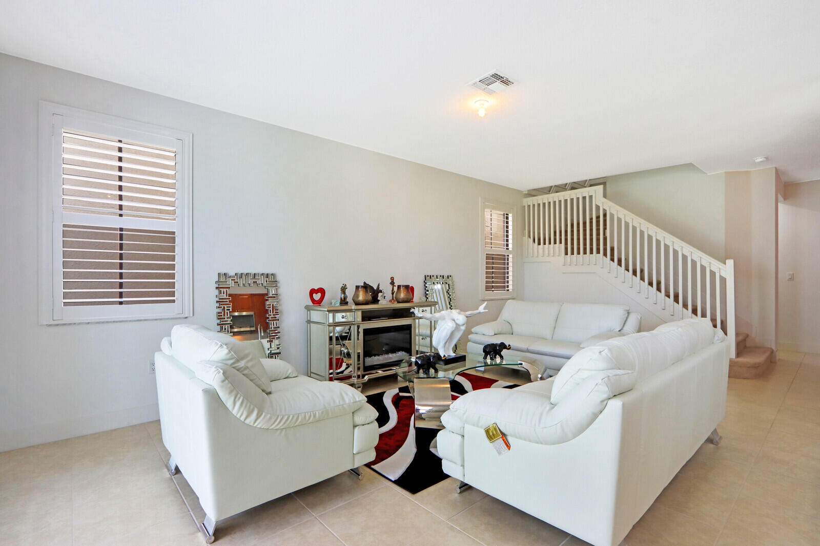 6024 Pine Tree Way Riviera Beach, FL 33410 - Photo 5 of 26 a living room with furniture and a window