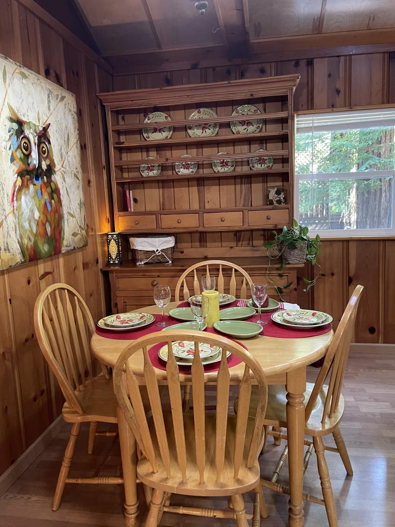 155 McGaffigan Mill Road Boulder Creek, CA 95006 - Photo 5 of 23 a view of a dining room with furniture window and outside view