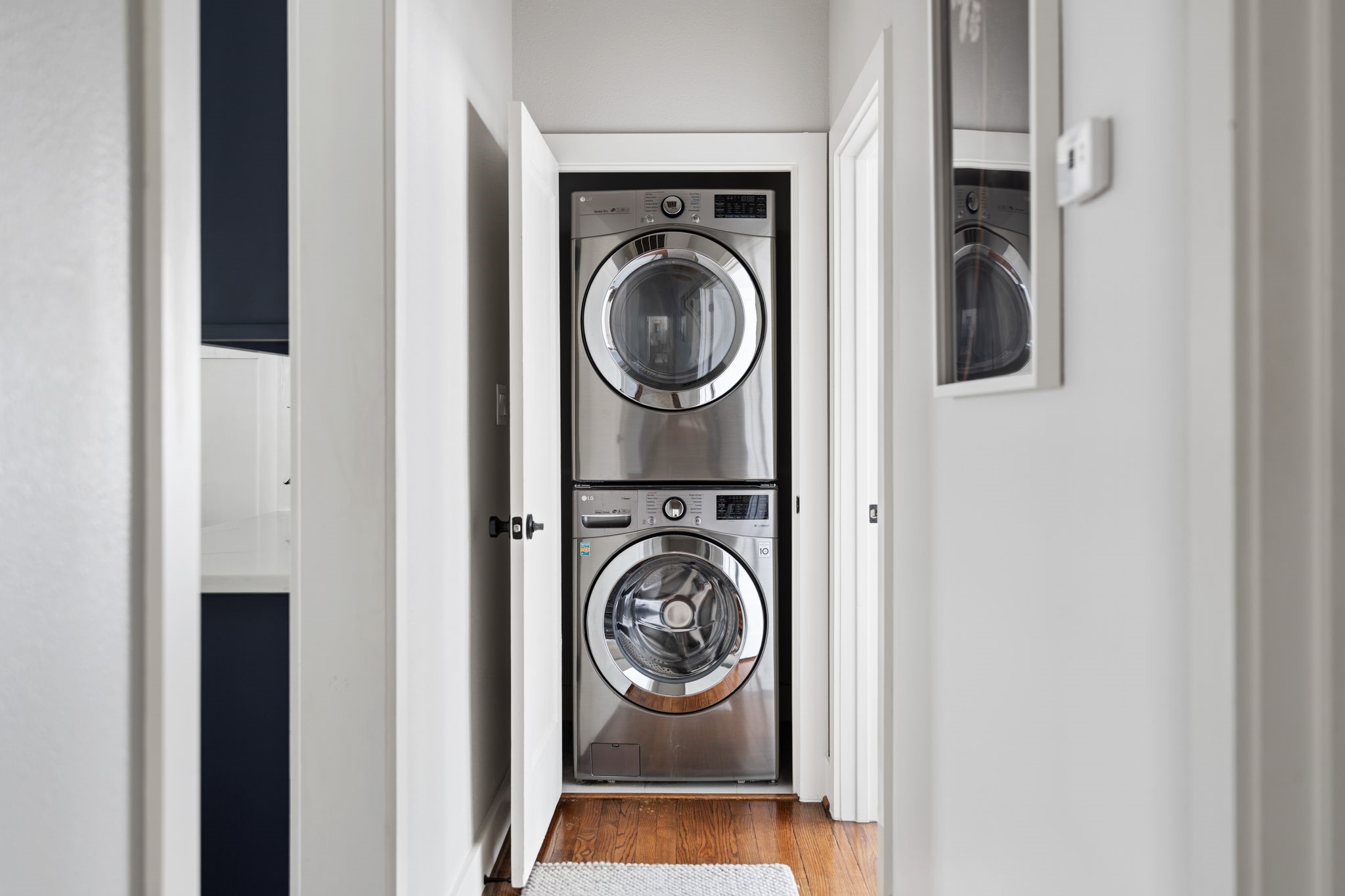 3206 Morrison Street Houston, TX 77009 - Photo 18 of 30 A convenient in house utility room outfitted with a stacked washer and dryer.