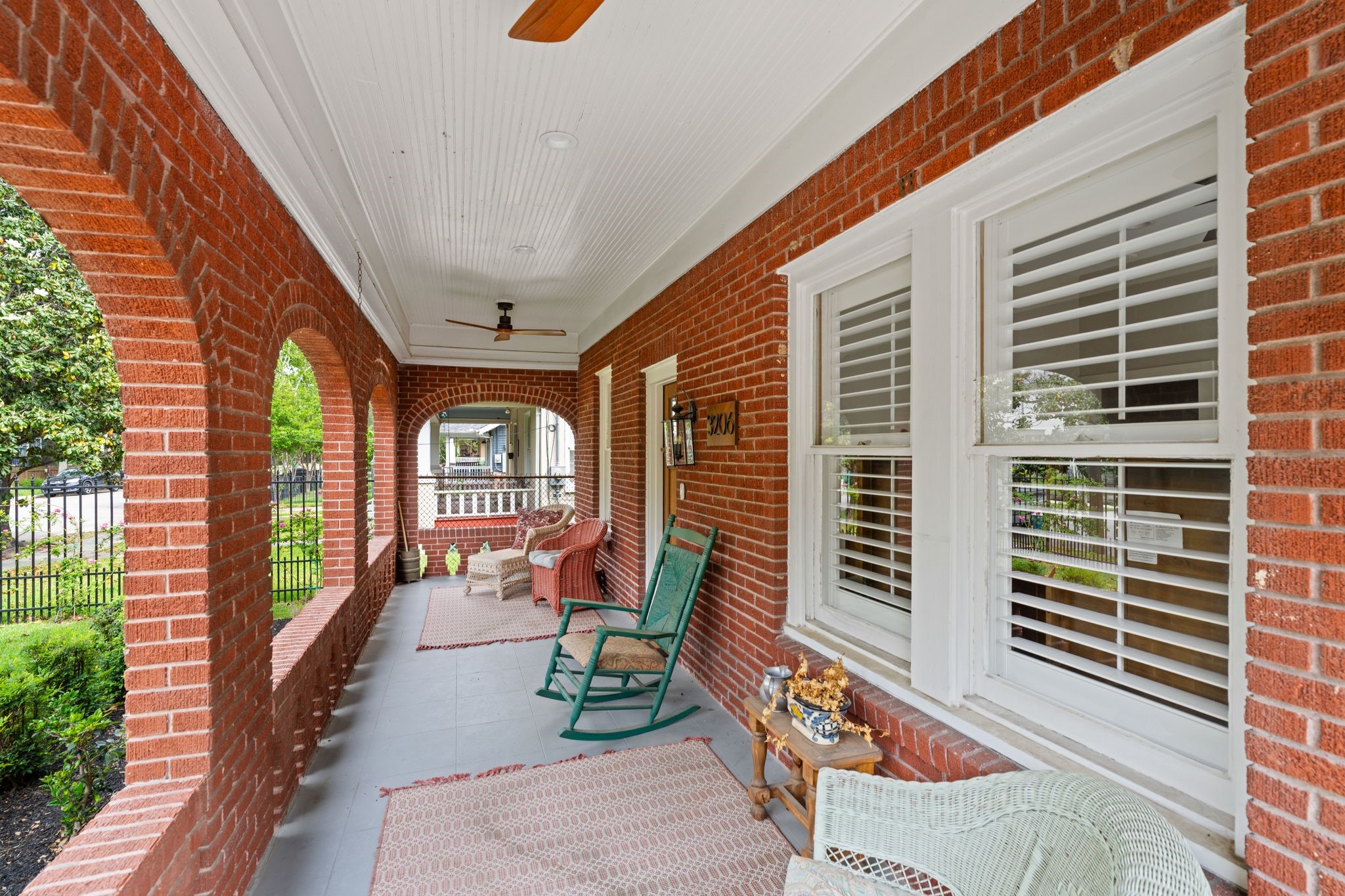 3206 Morrison Street Houston, TX 77009 - Photo 3 of 30 The front porch—spanning over 200 square feet—with ceiling fans, recessed lighting, and column light sensors, sets the tone for the charm that lies within.
