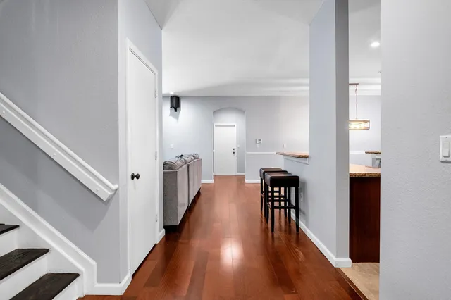 a view of a livingroom with wooden floor
