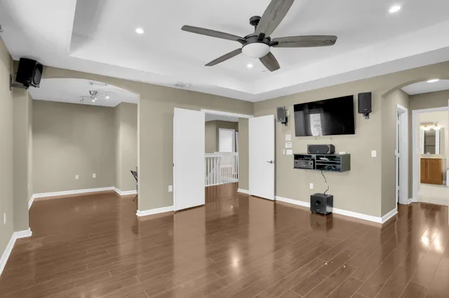 a view of a house with a yard and sitting area