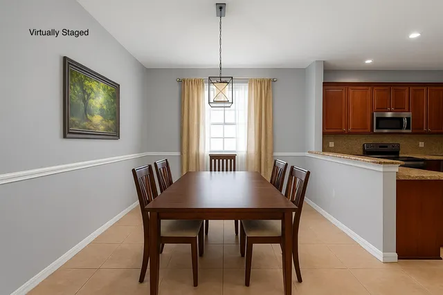 a bathroom with a granite countertop toilet sink and mirror