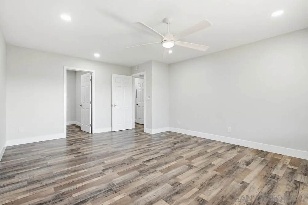 25147 Jack Rabbit Acres, Unit 2 Escondido, CA 92026 - Photo 15 of 39 a view of an empty room with wooden floor