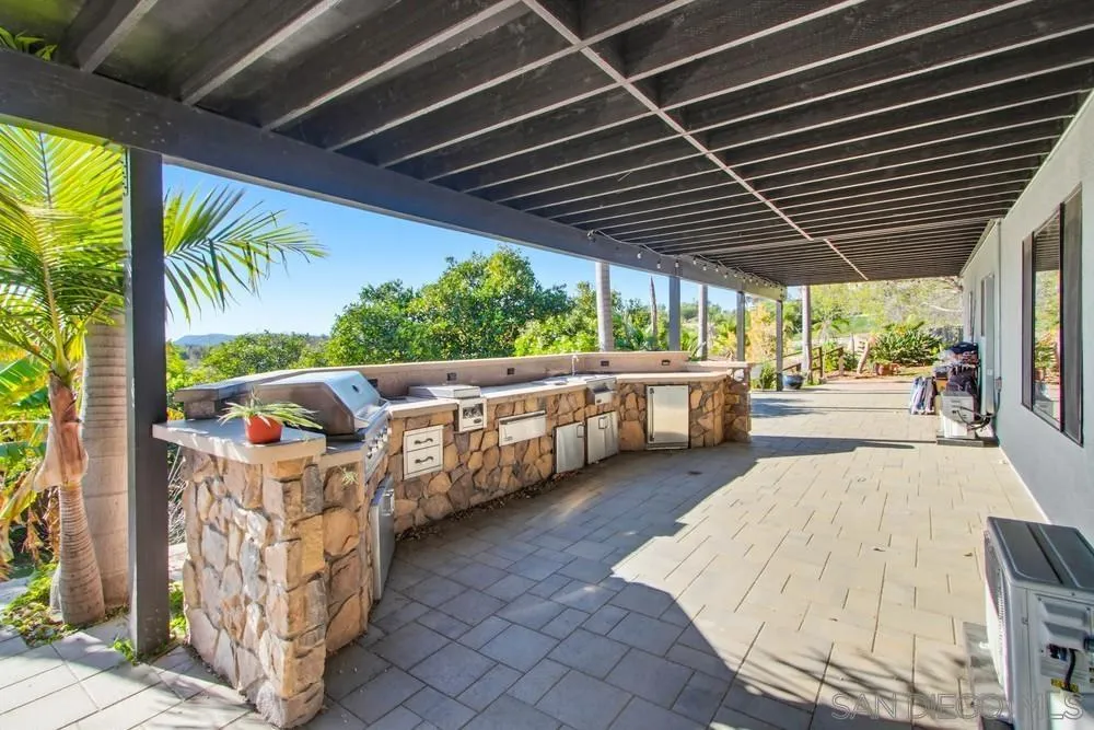 25147 Jack Rabbit Acres, Unit 2 Escondido, CA 92026 - Photo 22 of 39 a view of a backyard with seating space