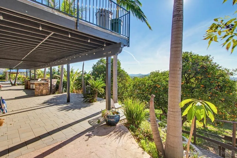 25147 Jack Rabbit Acres, Unit 2 Escondido, CA 92026 - Photo 24 of 39 a view of a swimming pool with a patio