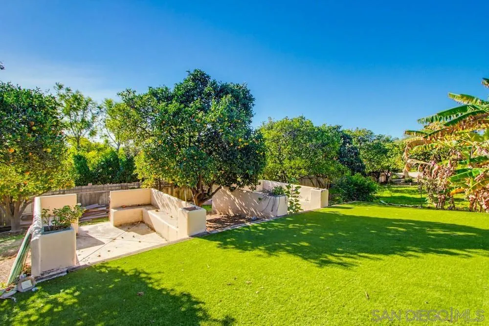 25147 Jack Rabbit Acres, Unit 2 Escondido, CA 92026 - Photo 37 of 39 a view of a backyard with plants and a garden