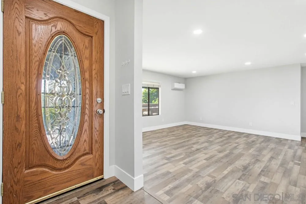 25147 Jack Rabbit Acres, Unit 2 Escondido, CA 92026 - Photo 5 of 39 a view of front door with wooden floor