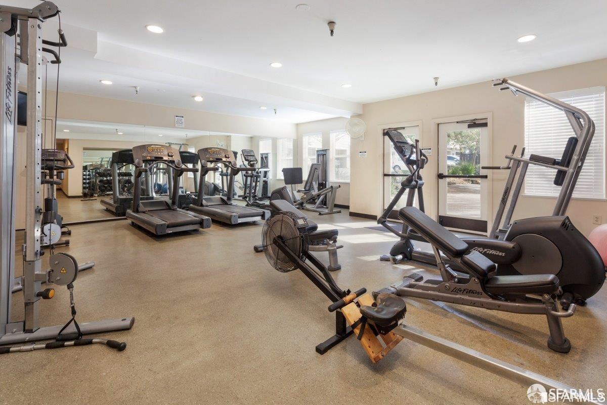 2225 23rd Street, Unit 111 San Francisco, CA 94107 - Photo 5 of 18 a view of a room with gym equipment