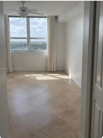 a view of empty room with window