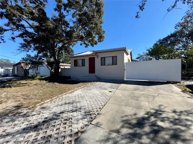 a house view with a outdoor space