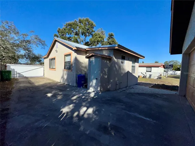 a view of a house with a patio