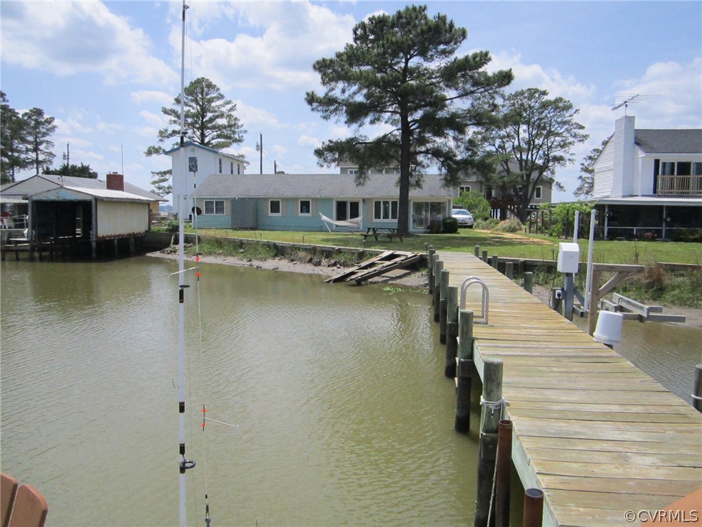 1264 Little Florida Road Farnham, VA 22460 - Photo 21 of 42 a view of a lake with a house