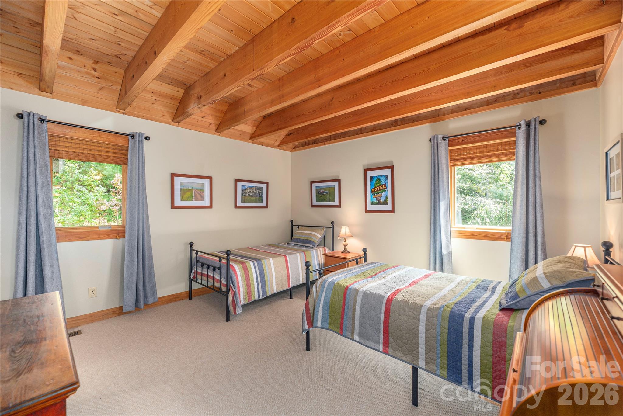 116 Ivy Road Mills River, NC 28759 - Photo 24 of 45 a spacious bedroom with a bed and a window