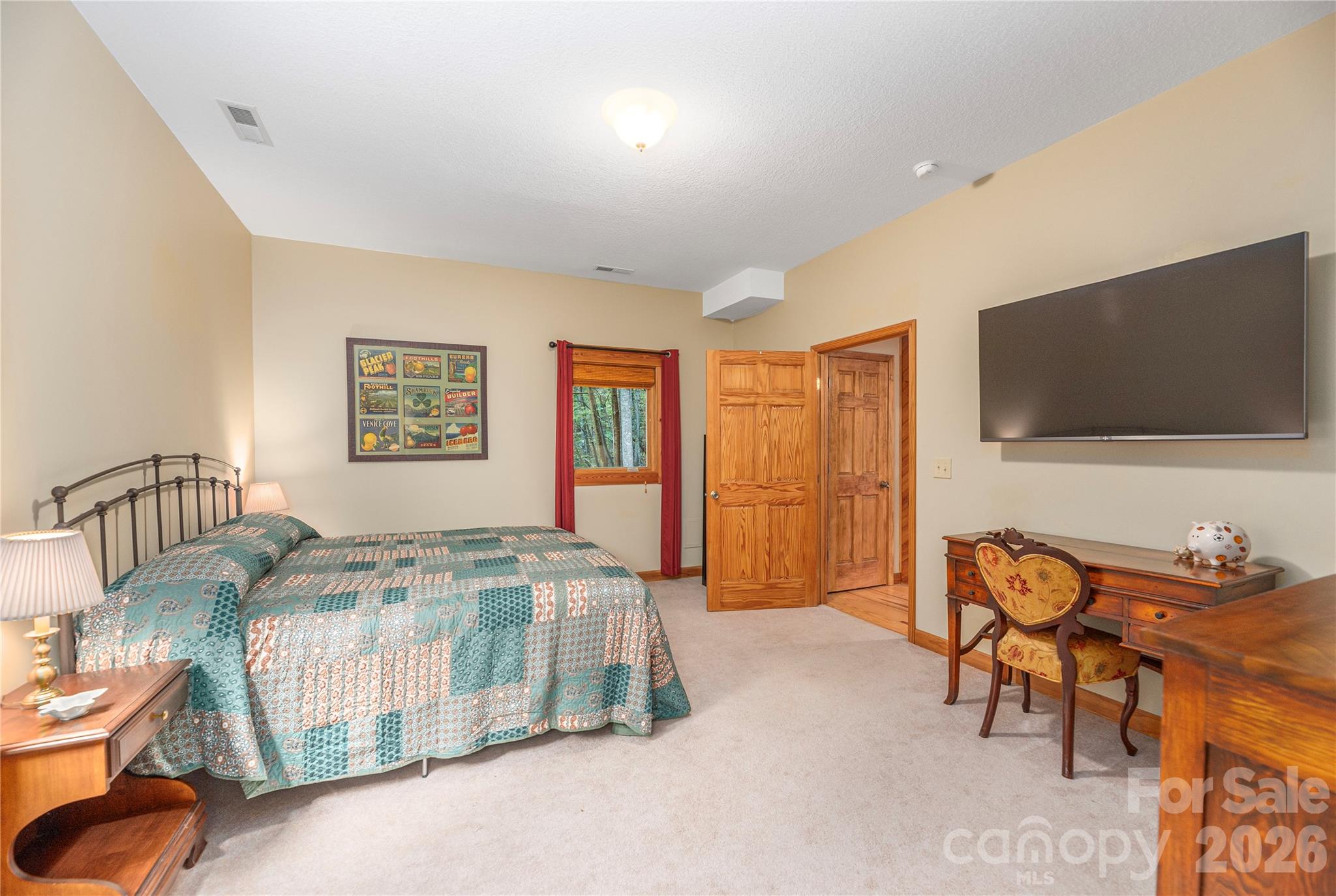 116 Ivy Road Mills River, NC 28759 - Photo 32 of 45 a living room with furniture and a flat screen tv
