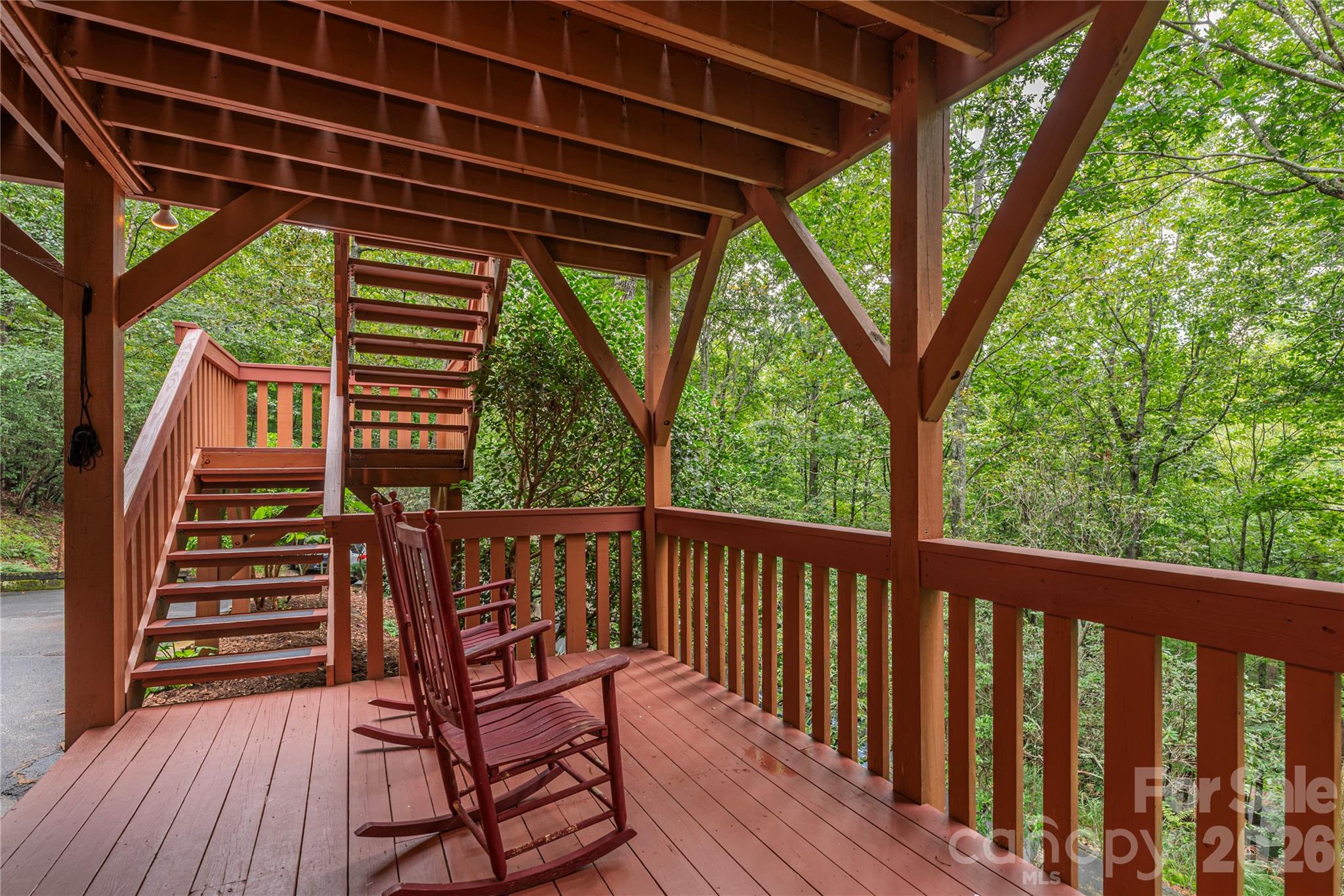 116 Ivy Road Mills River, NC 28759 - Photo 36 of 45 a view of a two chairs in the balcony