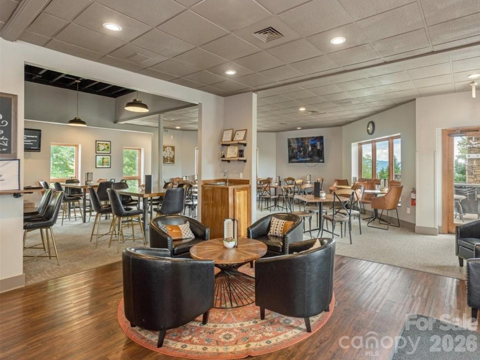 116 Ivy Road Mills River, NC 28759 - Photo 45 of 45 a living room with lots of furniture and a wooden floor
