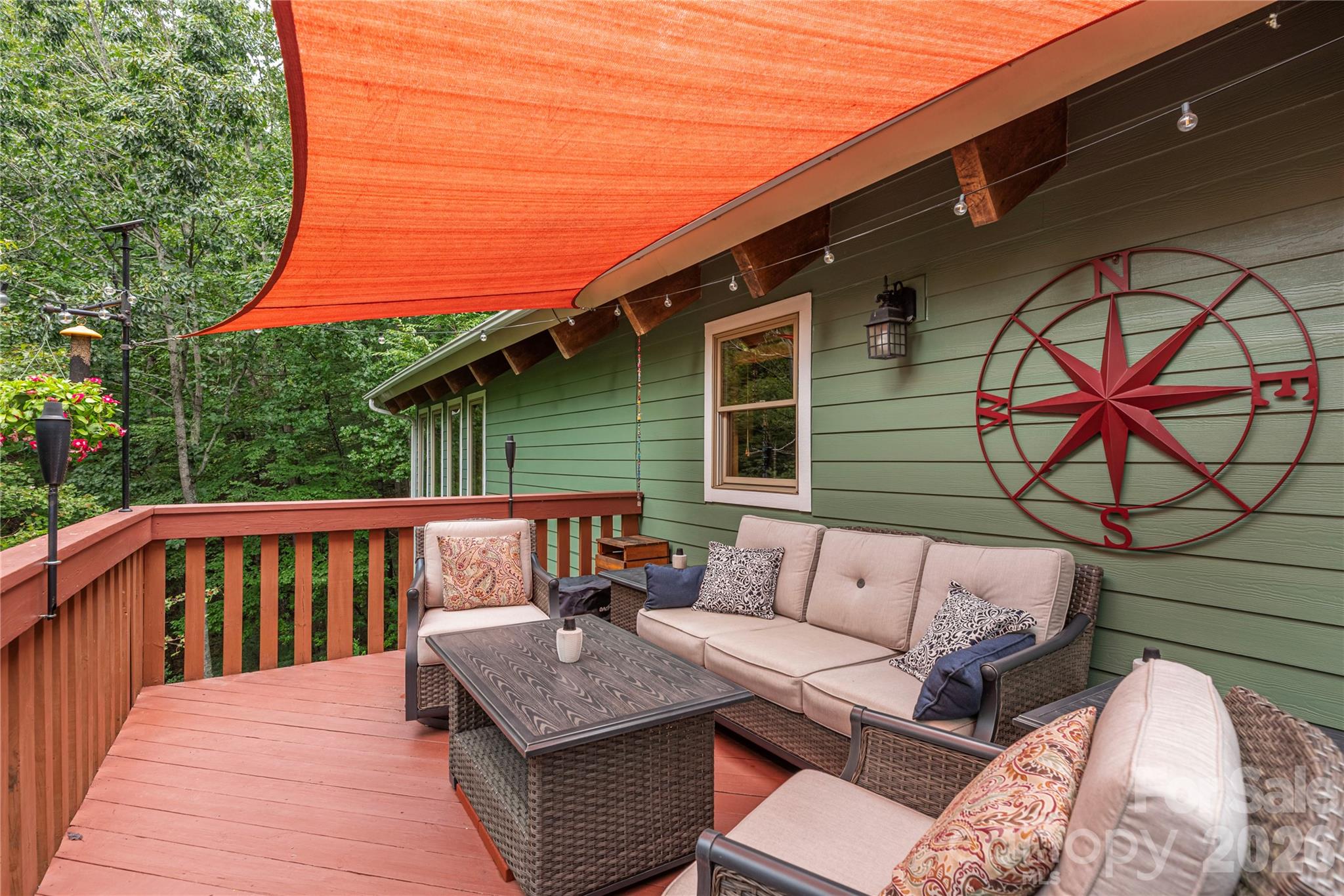 116 Ivy Road Mills River, NC 28759 - Photo 6 of 45 a view of sitting area with furniture and wooden deck