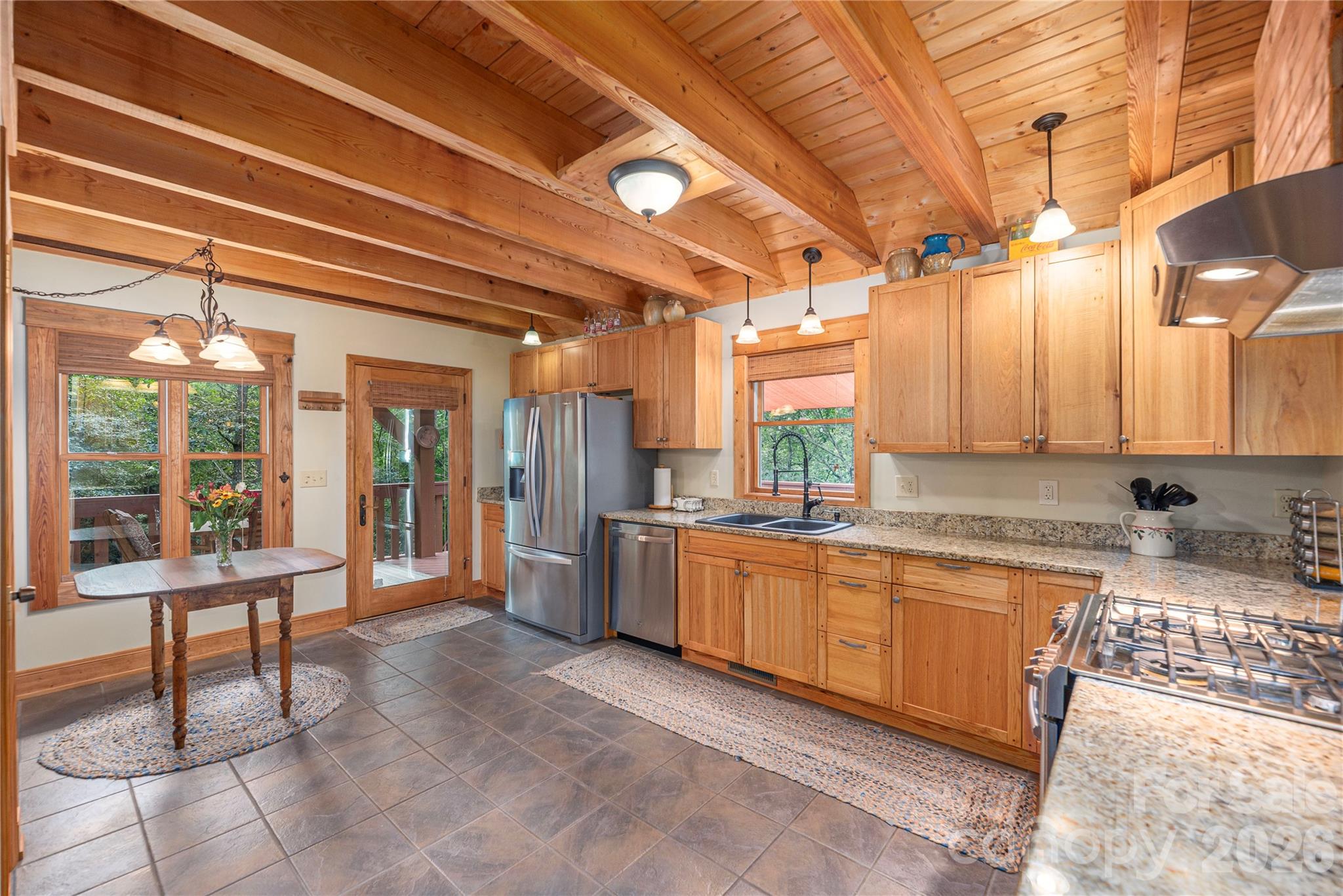 116 Ivy Road Mills River, NC 28759 - Photo 7 of 45 a large white kitchen with a large window