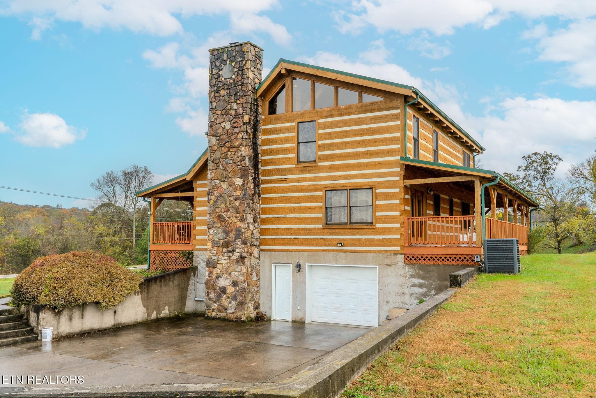2597 Rutledge Pike Blaine, TN 37709 - Photo 29 of 30 a front view of a house with a yard