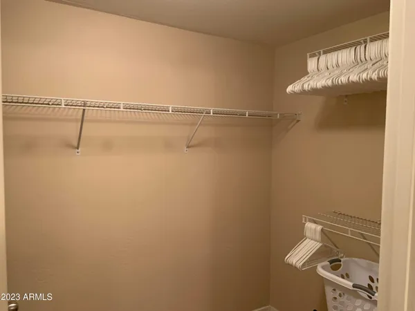 a view of a room with racks on the wall