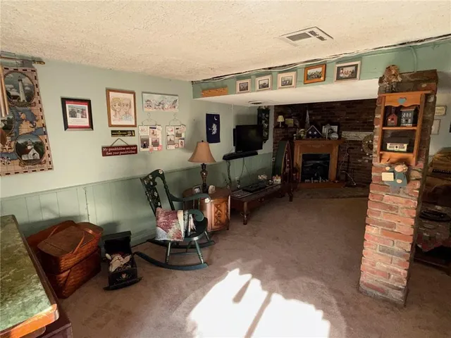 a room with lots of furniture and clutter