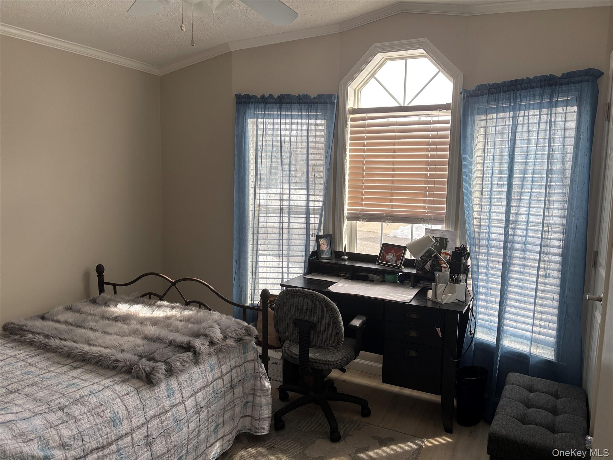 1661 Old Country Road, Unit 69 Riverhead, NY 11901 - Photo 11 of 37 a bedroom with a bed and a window