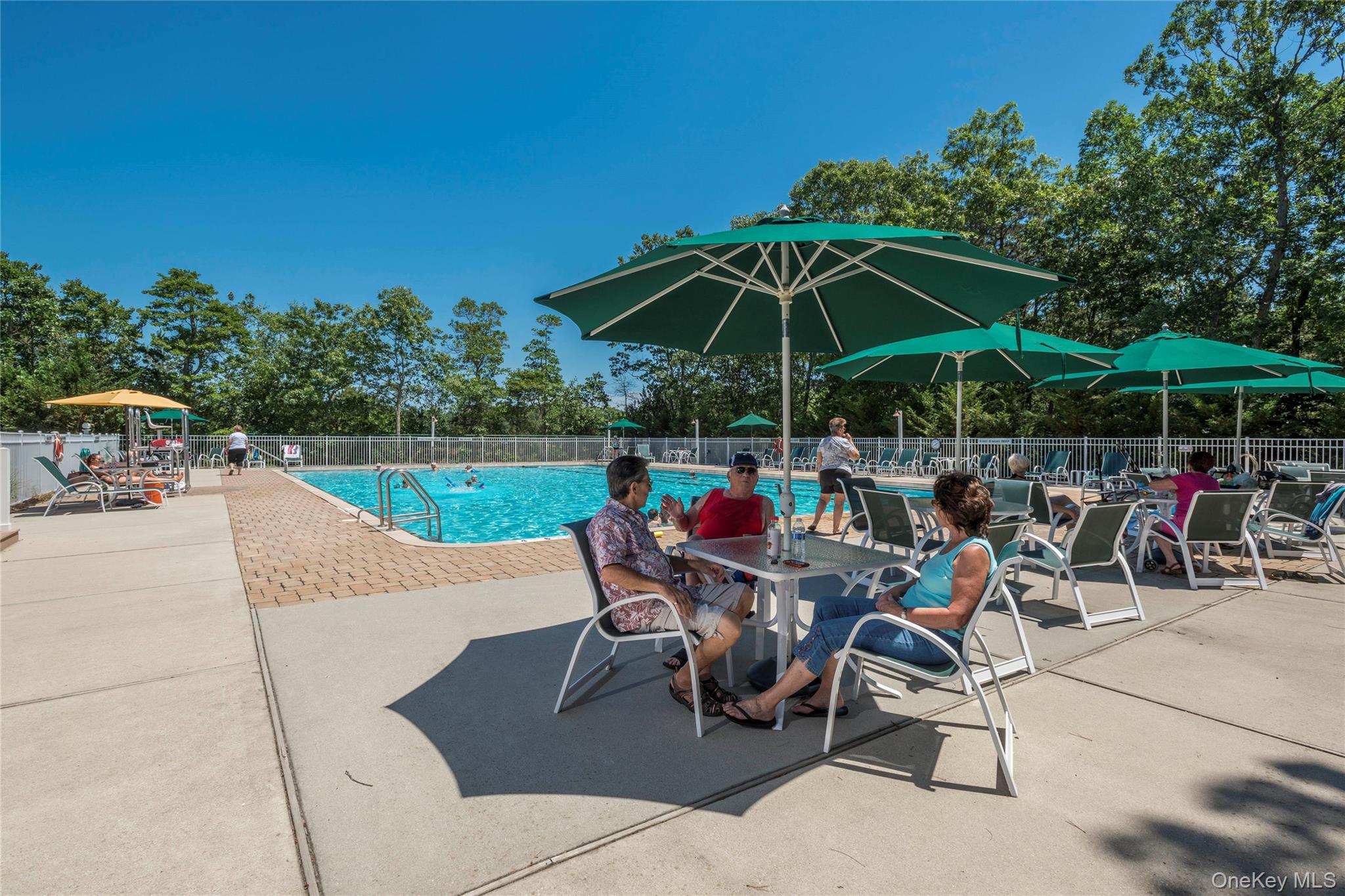 1661 Old Country Road, Unit 69 Riverhead, NY 11901 - Photo 28 of 37 a view of outdoor space yard and patio