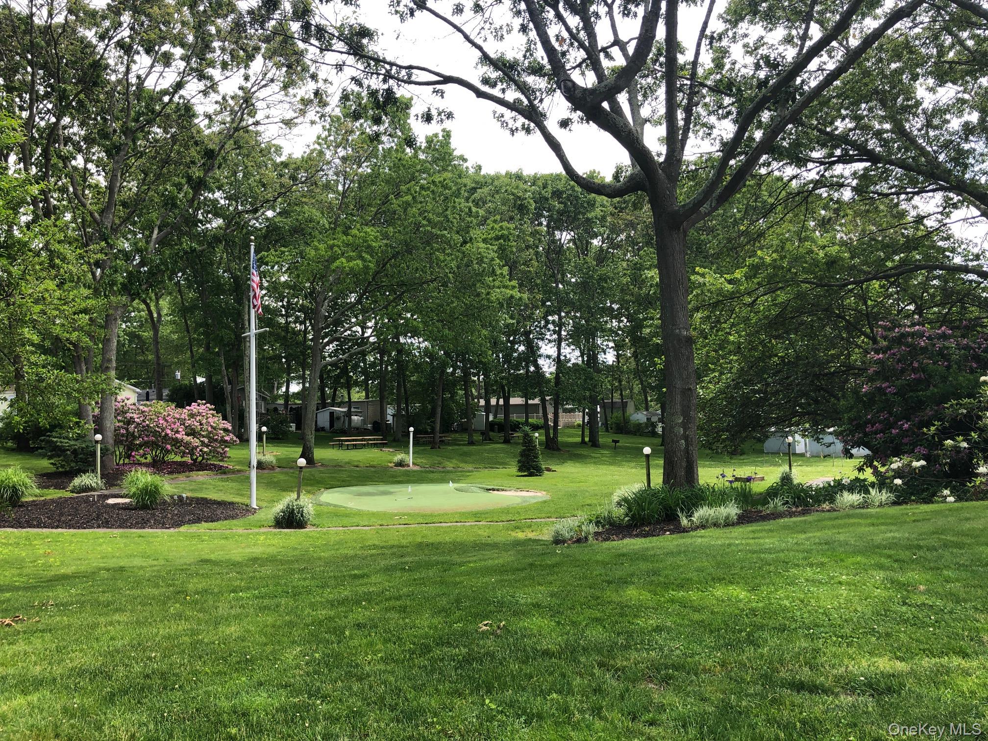 1661 Old Country Road, Unit 69 Riverhead, NY 11901 - Photo 34 of 37 a view of park