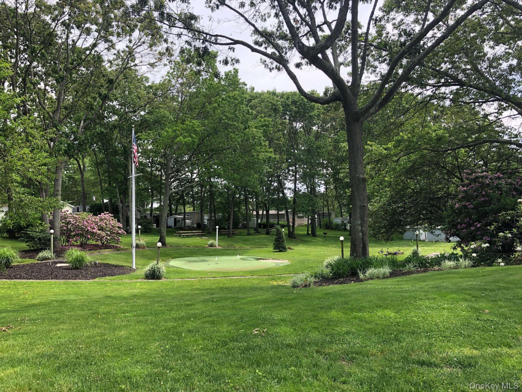 1661 Old Country Road, Unit 69 Riverhead, NY 11901 - Photo 35 of 37 a view of park