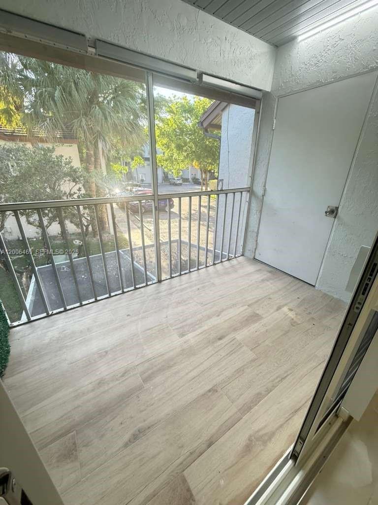 9307 Southwest 138th Place, Unit 9307 Miami, FL 33186 - Photo 14 of 15 a view of a balcony