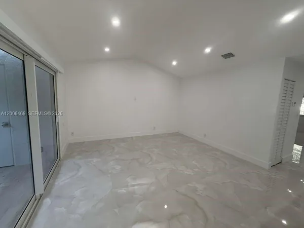 an empty room with a natural light