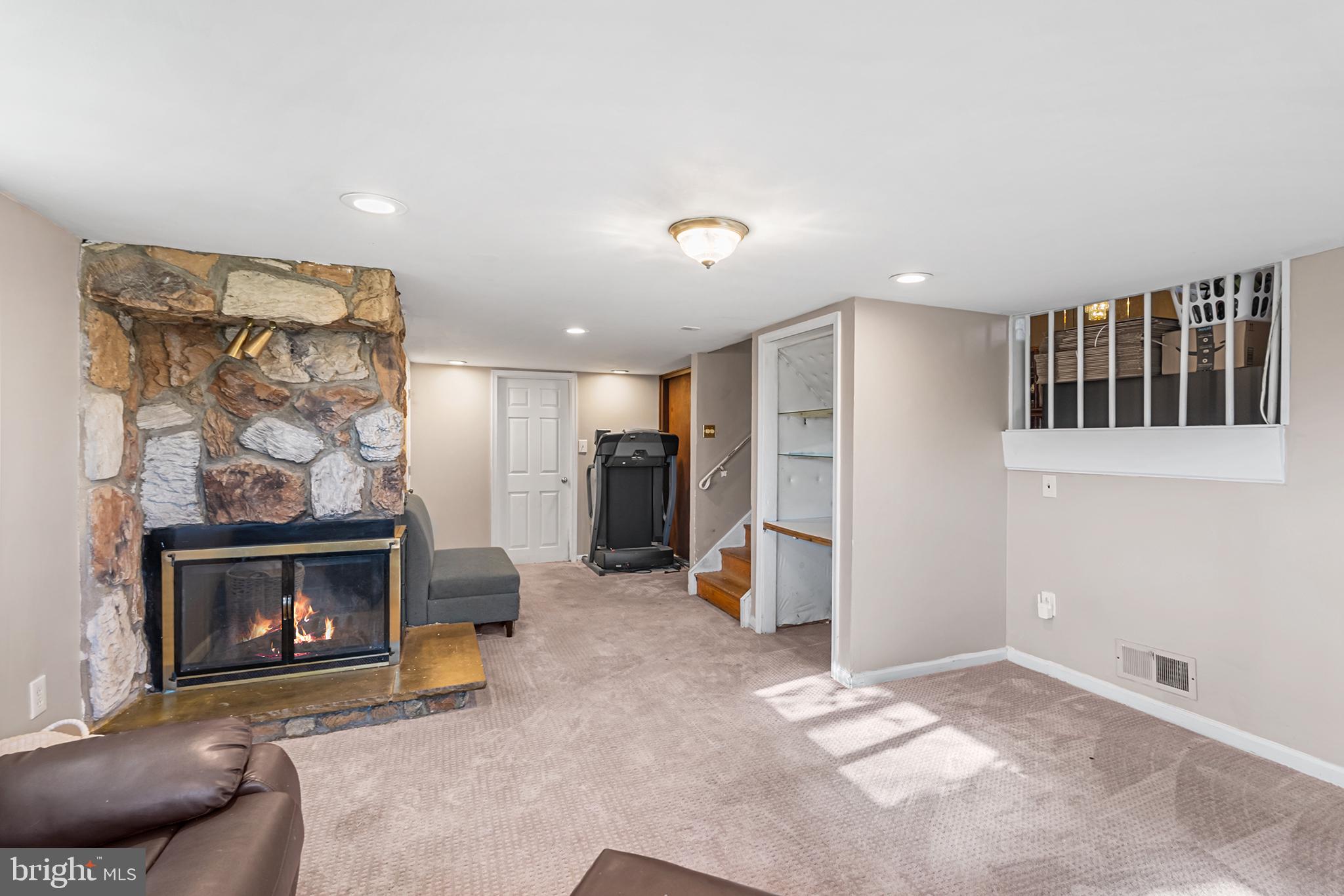 8308 Cobden Road Glenside, PA 19038 - Photo 15 of 29 Cozy retreat with stone fireplace.