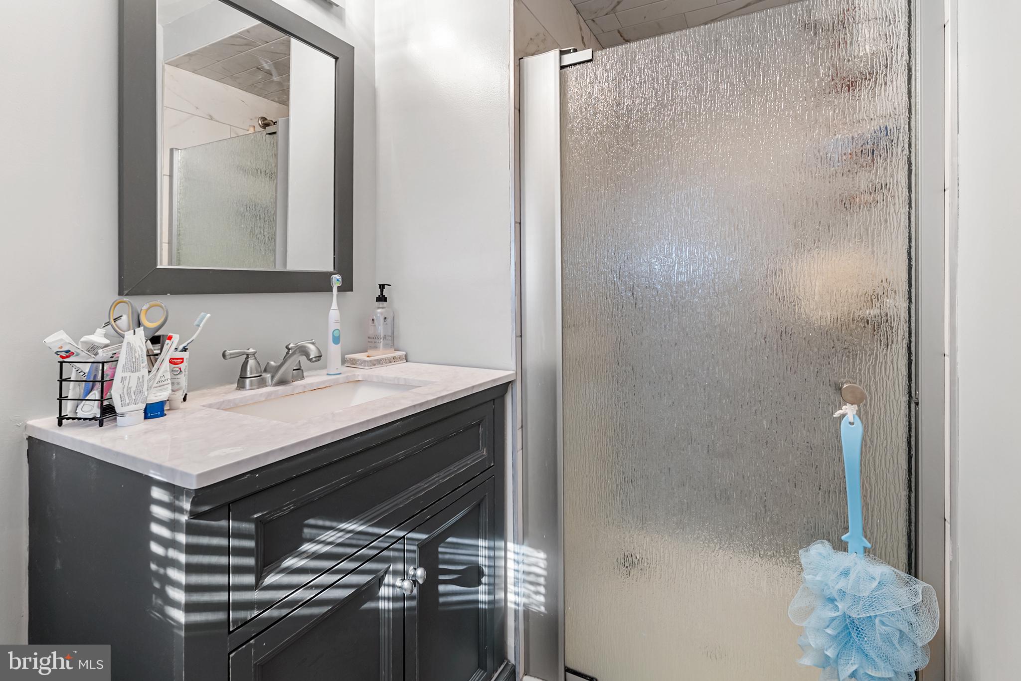 8308 Cobden Road Glenside, PA 19038 - Photo 21 of 29 Modern bathroom with sleek finishes.