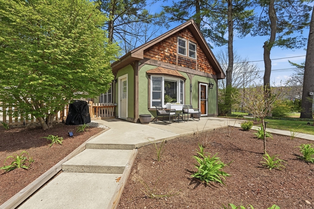 136 Flynt Street Palmer, MA 01069 - Photo 2 of 28 a view of a white house with a outdoor space