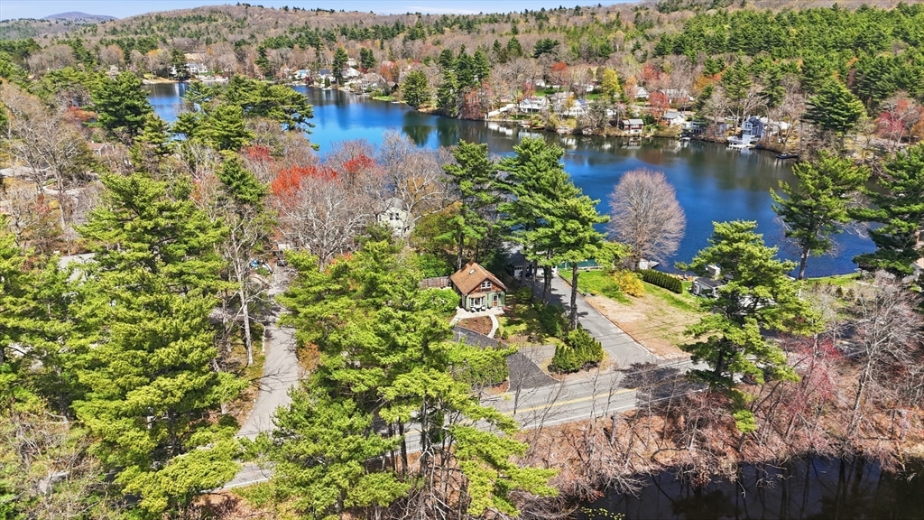 136 Flynt Street Palmer, MA 01069 - Photo 26 of 28 an aerial view of city and lake with trees all around