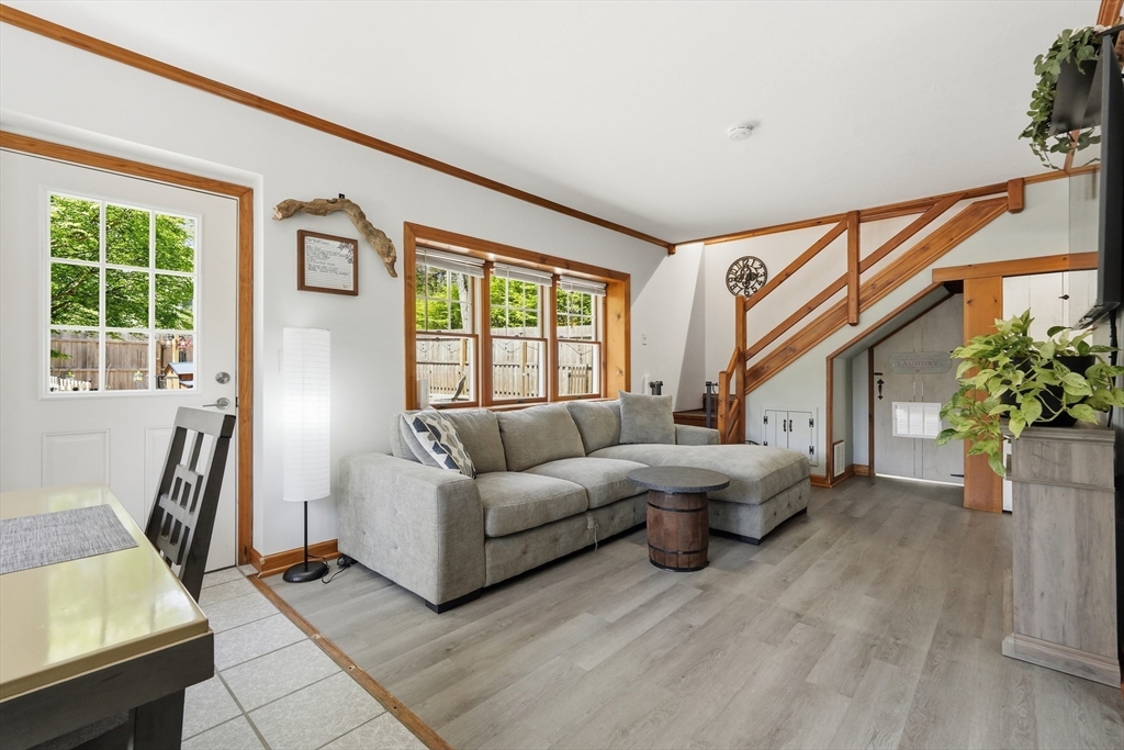 136 Flynt Street Palmer, MA 01069 - Photo 10 of 28 a living room with patio furniture and a large window