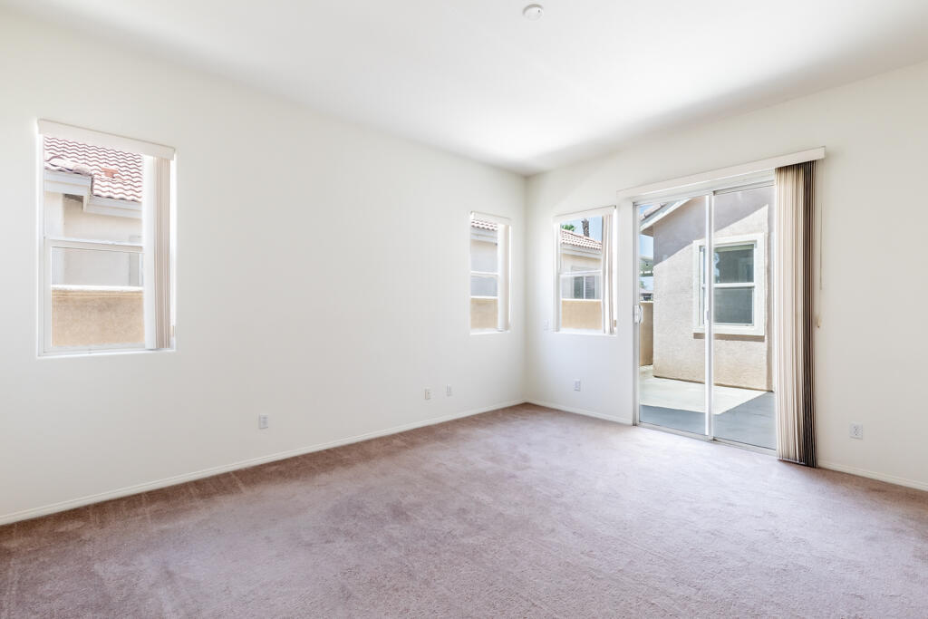 49635 Wayne Street Indio, CA 92201 - Photo 12 of 21 an empty room with windows