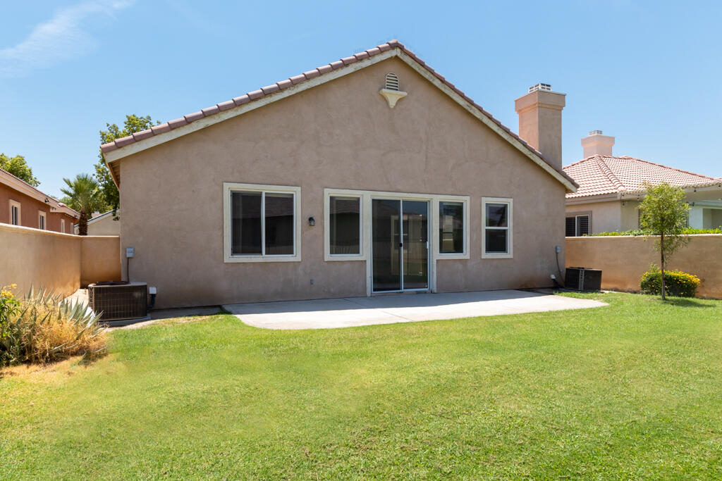 49635 Wayne Street Indio, CA 92201 - Photo 18 of 21 a house that has a big yard in front of it