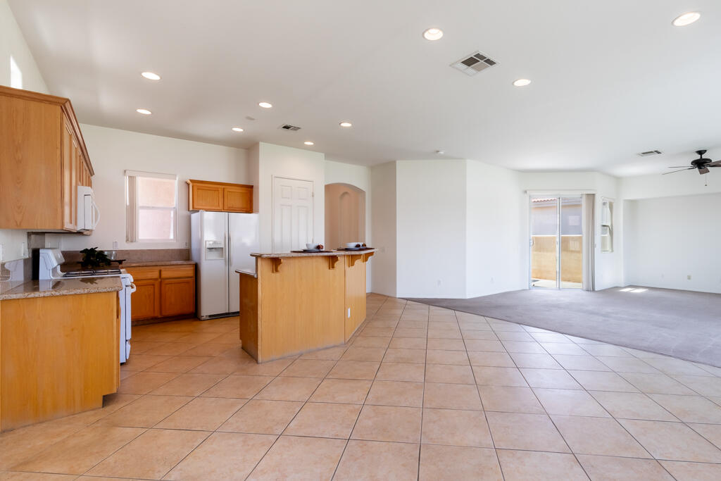 49635 Wayne Street Indio, CA 92201 - Photo 5 of 21 a view of a kitchen with microwave and cabinets