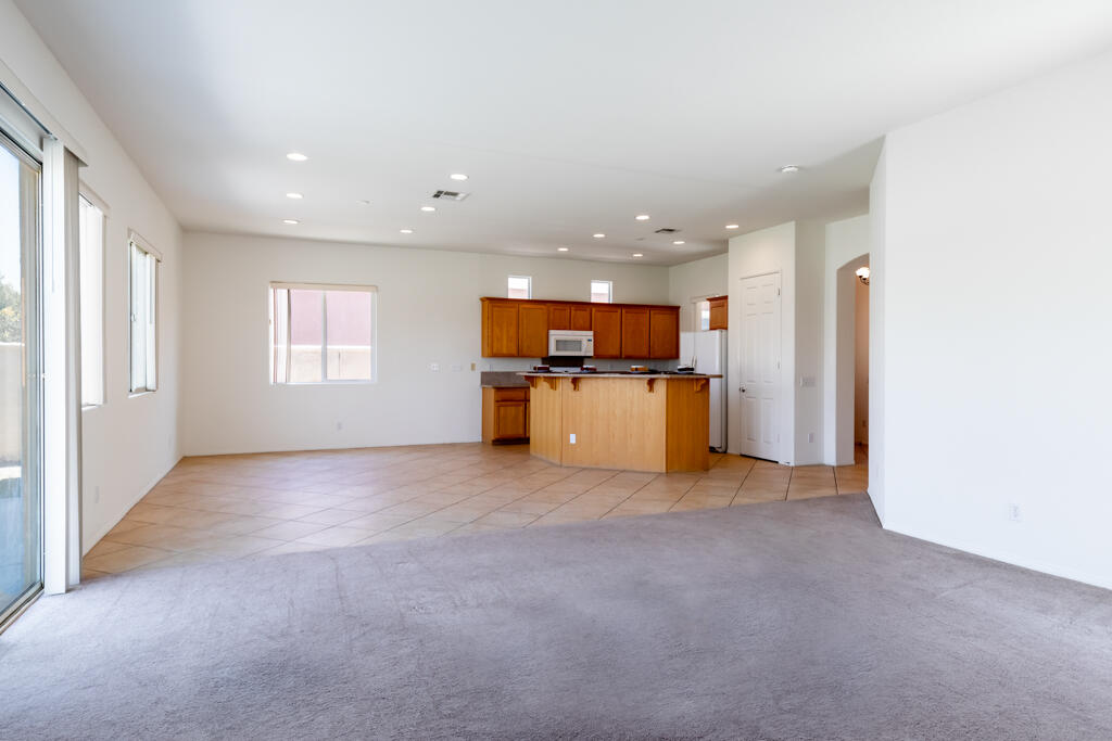 49635 Wayne Street Indio, CA 92201 - Photo 6 of 21 a view of a kitchen with a sink and microwave